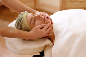 facial massage for a girl at a massage therapist