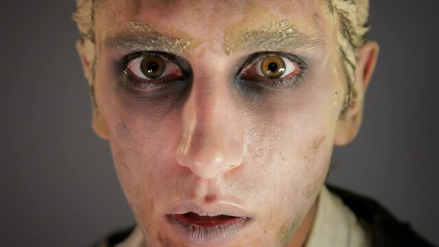 Close up of face of zombie man