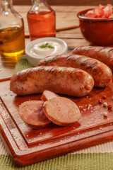 Brazilian pork sausage  BBQ - Churrasco de linguiça de suina close up