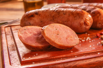 Brazilian pork sausage  BBQ - Churrasco de linguiça de suina close up