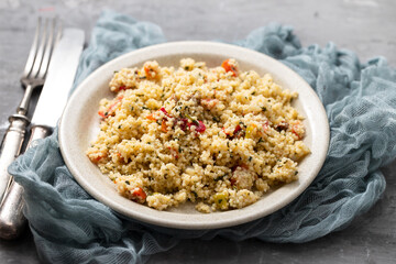 tabbouleh on small plate on ceramic background