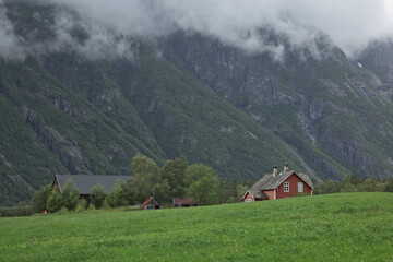 The village of Eidfjord in Norway is a major cruise ship port of call. It is situated at the end of the Eid Fjord, an inner branch of the large Hardangerfjorden