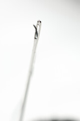 Needle and thread through