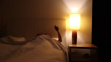 Woman getting out of bed. Person gets up at night