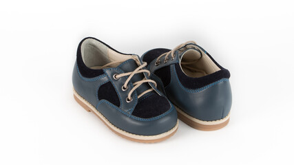 children's blue orthopedic shoes on a white background