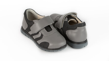 children's gray orthopedic shoes on a white background