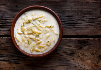 Bean pod soup, sour cream and dill