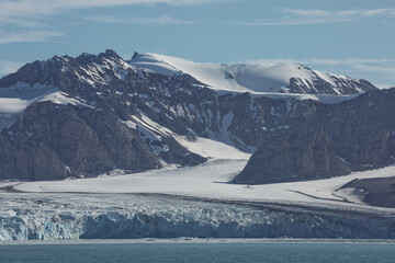 Mountains, glaciers and coastline landscape close to a village called "Ny-Ålesund" located at 79 degree North on Spitsbergen