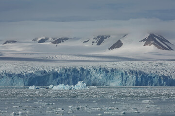 Mountains, glaciers and coastline landscape close to a village called "Ny-Ålesund" located at 79 degree North on Spitsbergen