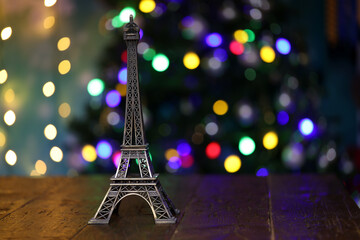 The eiffel tower model stands on the table