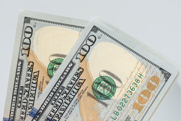 Close up of new hundred dollar banknote corner.
