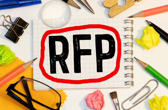 RFP Request For Proposal - handwriting on paper with cup of coffee and pen, acronym business concept