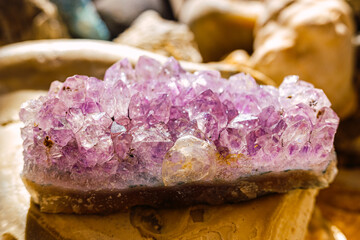 Amethyst rock on the table of a geology student.
