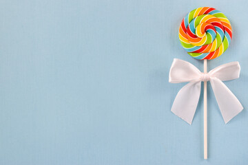 Sweets on a blue background. Postcard. Sweet Caramel's Birthday. This is an empty space. Top View Flat Layout