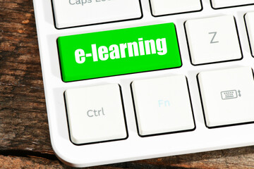e-learning text on button of computer keyboard. Time for distance learning.
