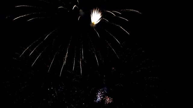 New year celebration of 2021 in midnight with sparkling fireworks and burining sparkles in the sky