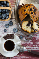 muffin with blueberries, coffee and chocolates