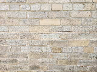 gray brick wall with specks