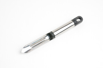 Fruit and vegetable scraper on a white background