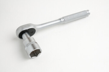 Wrench for nuts and bolts on a white background