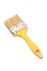 Paintbrush with yellow handle on white background