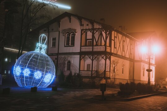 TRUSKAVETS, UKRAINE - DECEMBER 20, 2020: Night winter view of the city, Michael Bilas art Museum, Christmas Toys.