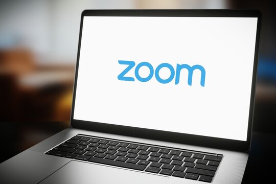 Zoom logo displayed on laptop computer. Editorial 3d rendering.