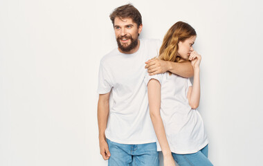 Fototapeta premium Cheerful man and woman t-shirts studio family lifestyle