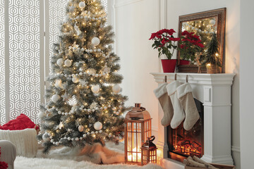 Fireplace in beautiful living room decorated for Christmas
