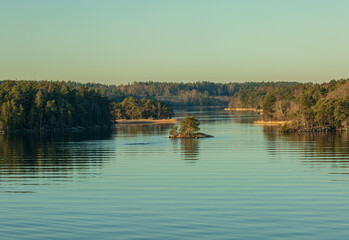 A small island between larger islands.