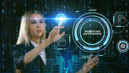 Business, Technology, Internet and network concept. Young businessman working on a virtual screen of the future and sees the inscription: Marketing automation