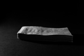 Serviette napkins against black background