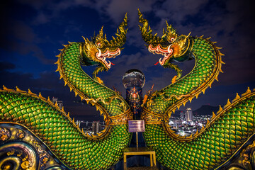 Background Wat Khao Phra Kru ,Landmark of sriracha city with two of great Nagas guarded entrance to...