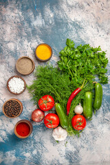 top view fresh greens with vegetables and seasonings on light background photo meal color salad ripe