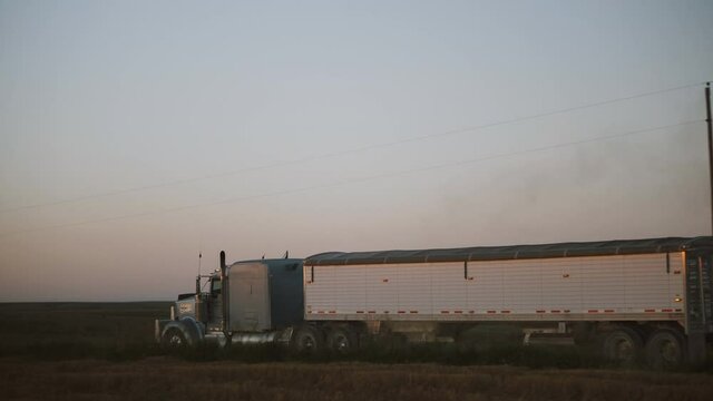 Moving Semi Leaving Smoke Trail 