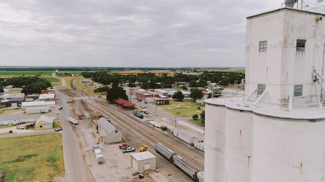 Rising Aerial of Grain Elevator in a Small Town