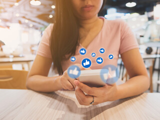 Social network sharing and commenting in the online community, Woman hand holding smartphone and using application social media