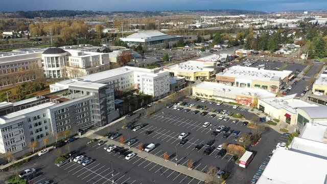 Flyover footage of the King County Superior Court at Kent Station, a shopping area in the Green River Valley near East Hill, Scenic Hill, Auburn, Renton, Federal Way in King County Washington