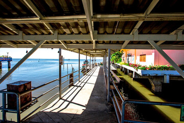 Fototapeta premium Background of important religious attractions (Wat Hong Thong), a large pagoda on the water, people popular for making merit during holidays in Chachoengsao Province of Thailand.