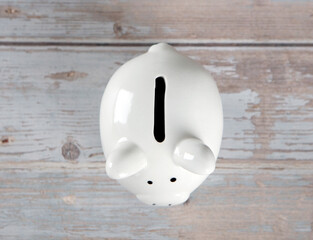 Looking down at the piggy bank on the table