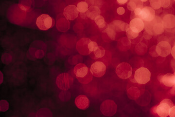 Abstract decorat  bokeh holiday christmas glowing lights on black