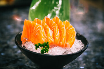 Salmon sashimi is often the first course