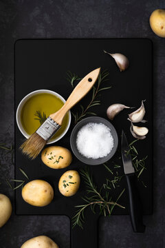 Potatoes brushed with olive oil and seasoned with salt and rosemary.