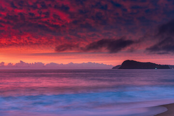 Naklejka na ściany i meble High Cloud Colours Up for Sunrise Solstice at the Seaside