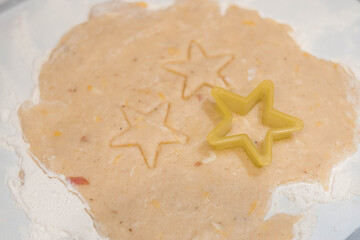 Bakery products. Christmas cookies. Cookie cutters. Cutting Christmas cookies from the dough. Dough...