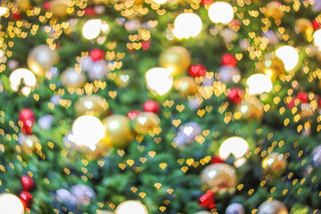 Obraz na płótnie Canvas Blurred bokeh background created by the Christmas lights to celebrate the New Year. Beautiful Christmas lights backgrounds and backdrop can be used for any design Or a Christmas greeting card.