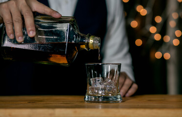 Bartender Serve Whiskey, on wood bar