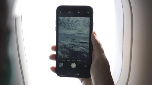 AirAsia Airbus A320 window view through an iPhone camera in slow motion