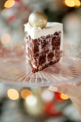 Plate with slice of tasty homemade chocolate cake. High quality photo.