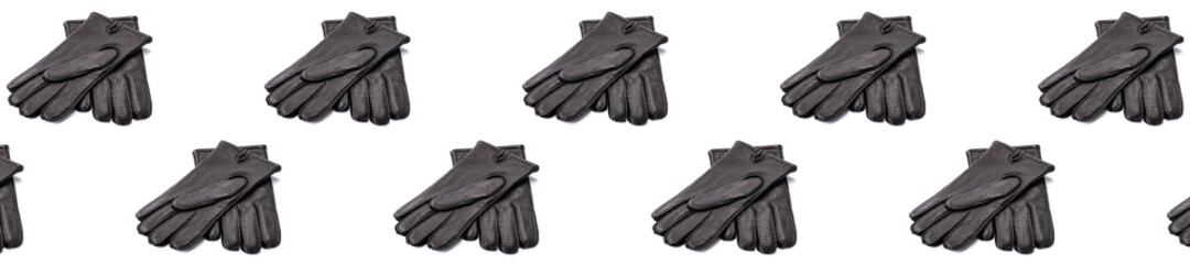 Seamless pattern with Pair of men's black leather gloves isolated on white background. black new leather gloves on white. Long wide Long wide banner